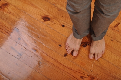bare feet on wood floor
