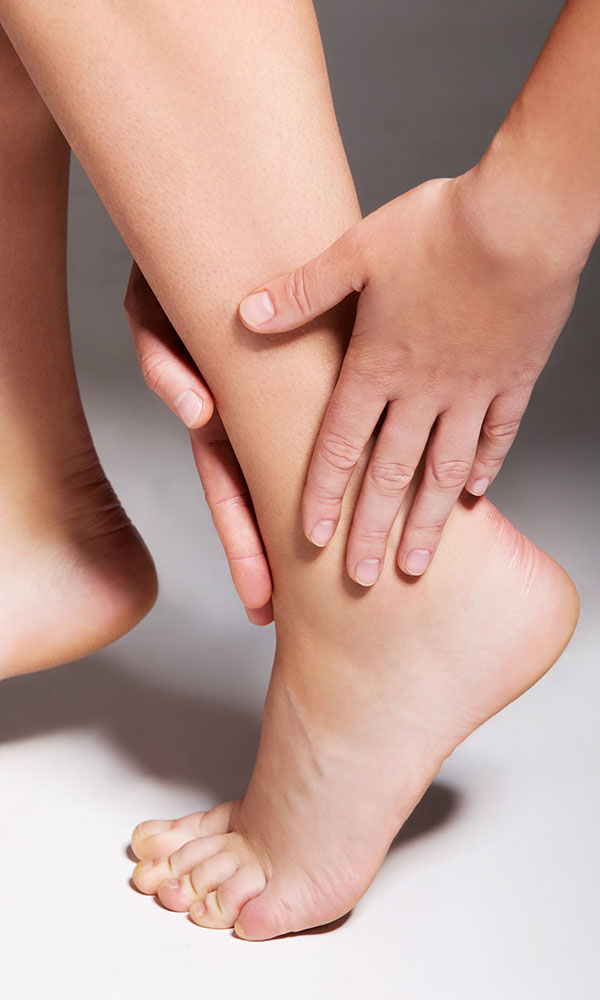 Patient with ankle pain at a Nassau County podiatrist on Long Island, NY